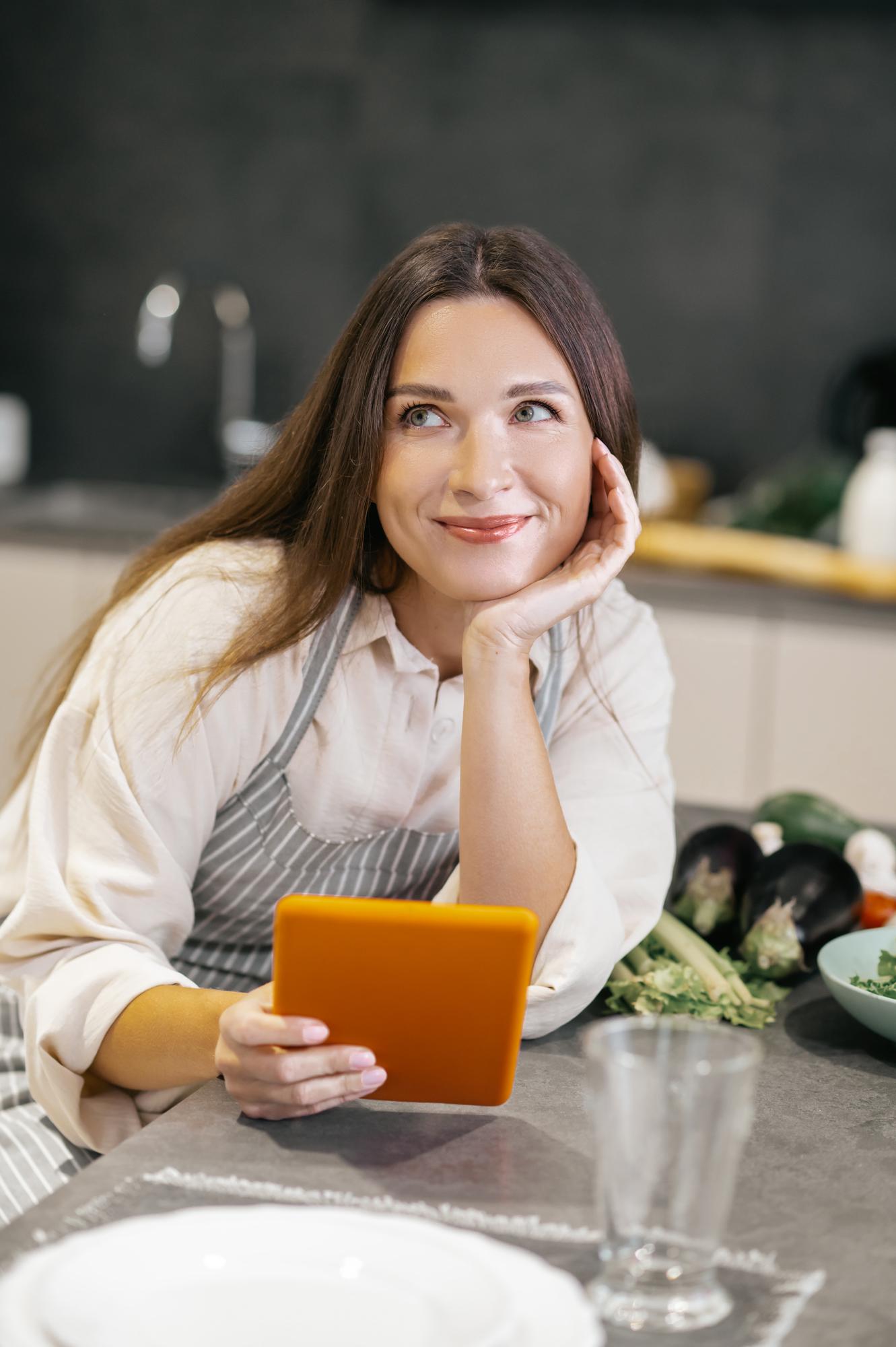 Instructor smiling in kitchen